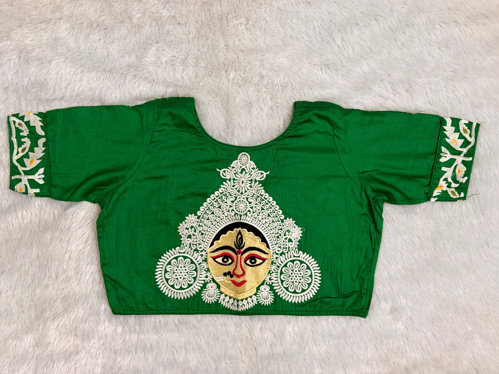 Dark green cotton silk durga embroidery on back side of blouse with piping