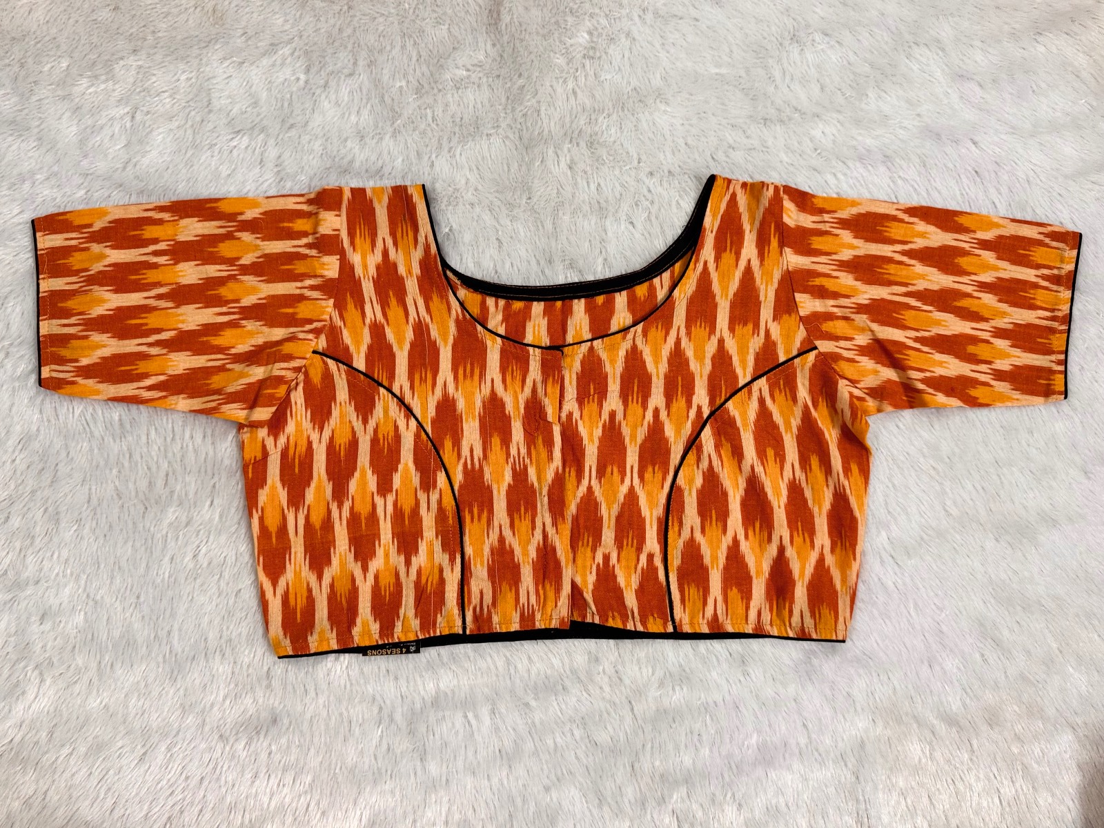 Yellow brown ikkat weave pure cotton blouse with black piping