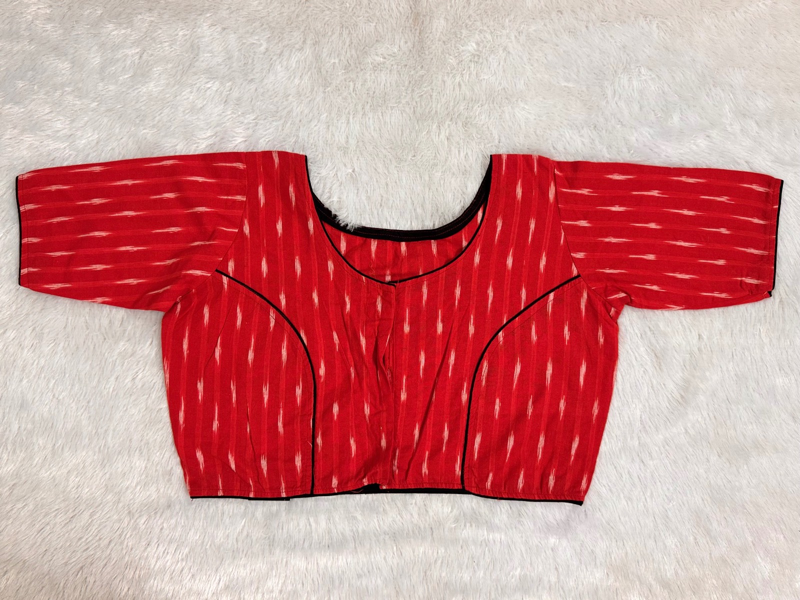 Red ikkat weave pure cotton blouse with black piping