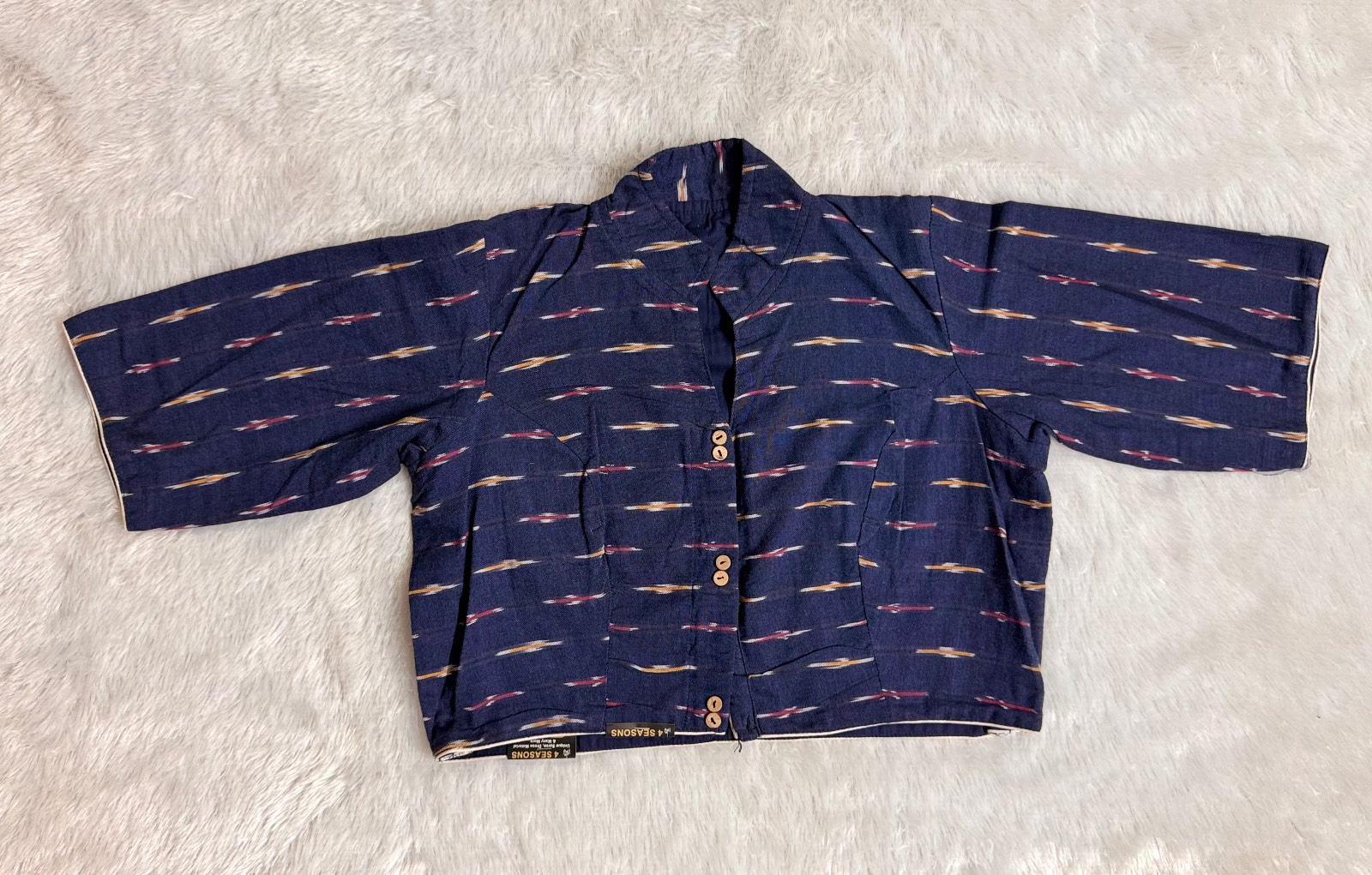 Dark blue pure cotton ikkat weave blouse with patch work back side of blouse